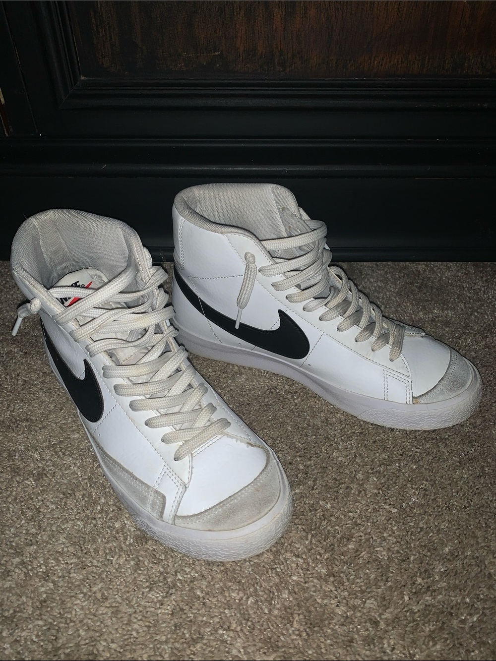 Nike Men’s White High-Top Sneakers with Black Swoosh